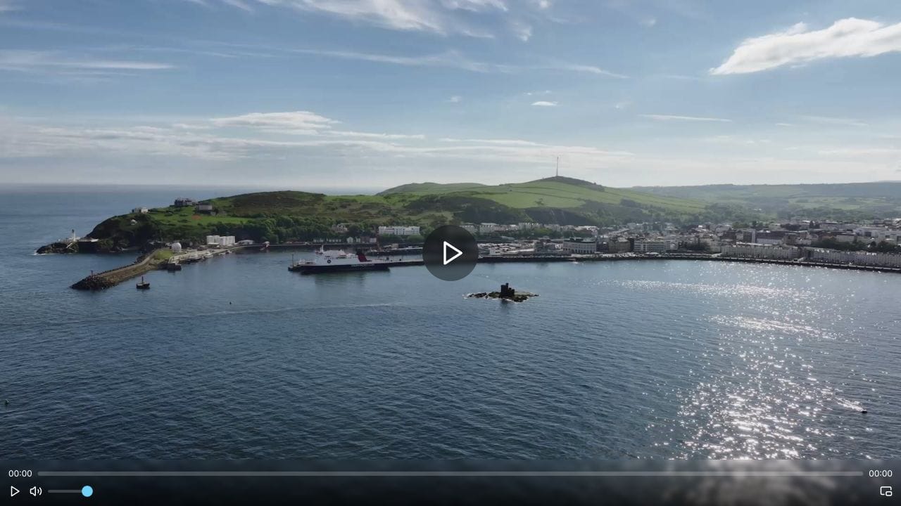 Vidreno's website video player displaying a coastal scene with playback controls