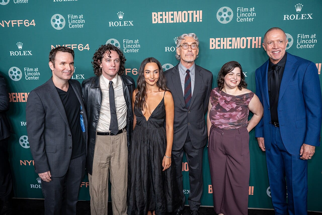 Tony Gilroy standing with members of the Behemoth composer collective at the New York Film Festival